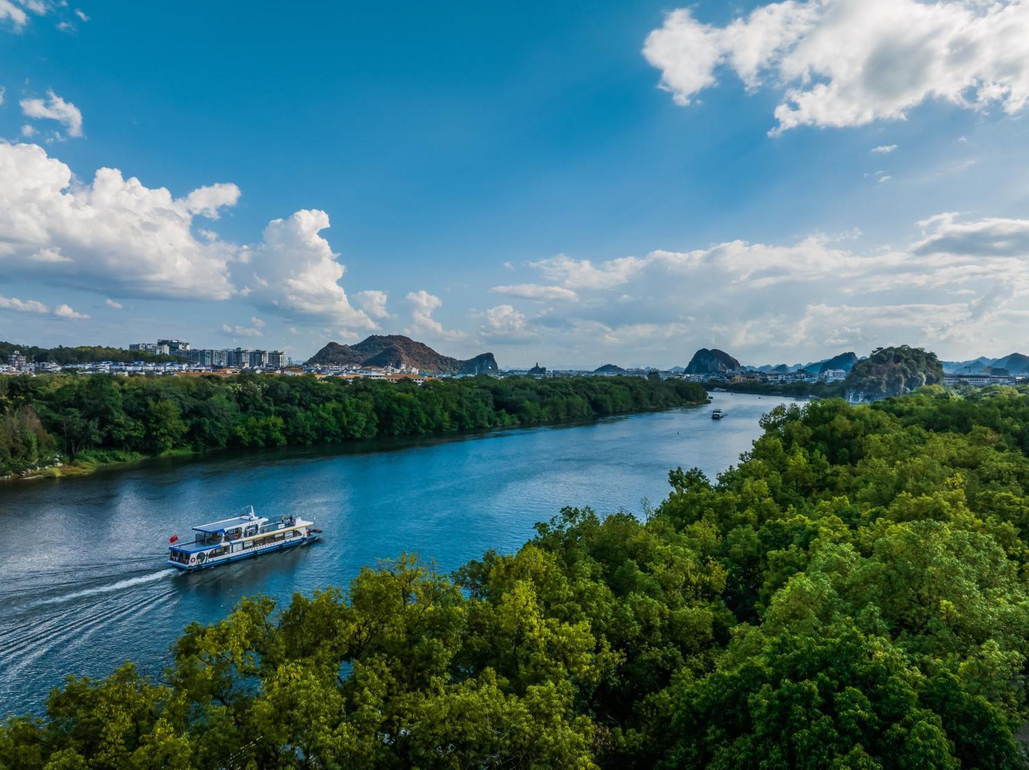 Riverside Wing Hotel Kujlin Kültér fotó